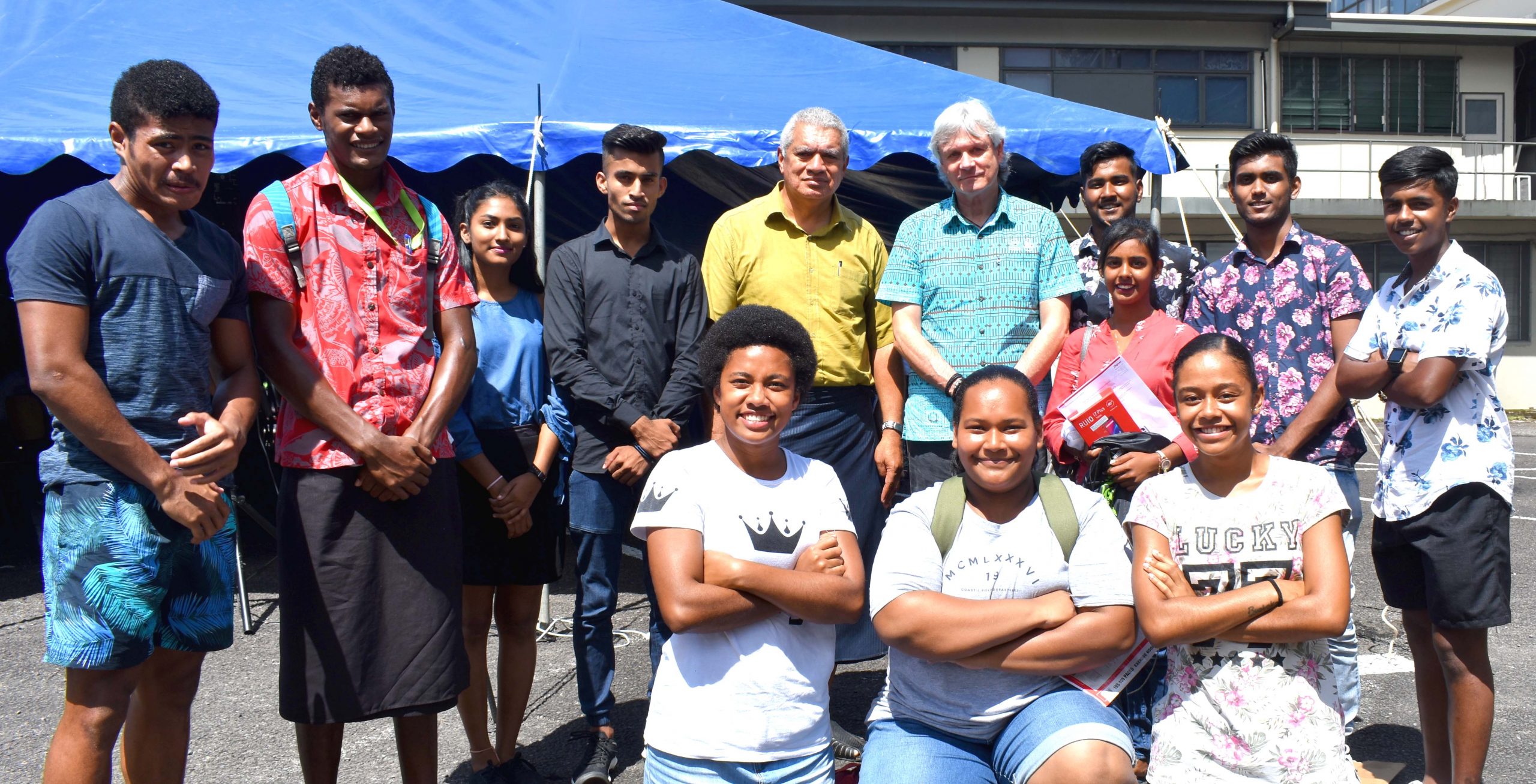 FNU Vice-Chancellor Professor Nigel Healey and Acting Dean CEST Salabogi Mavoa with students at CEST