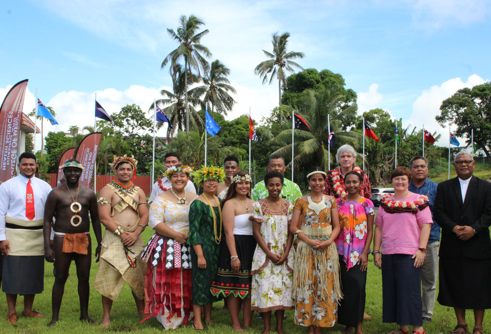 FNU Vice-Chancellor Professor Nigel Healey with CMNHS Dean, Dr William May, invited guests, senior staff and flag bearers