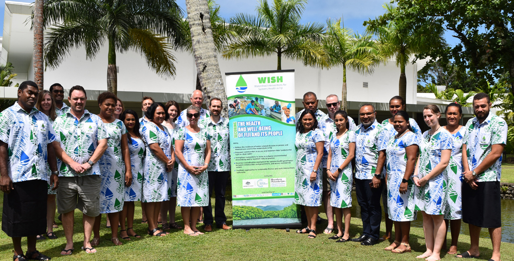 Dr Donald Wilson (standing front-3rd right) with participants of the WISH mid-term review workshop.