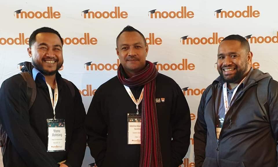 Dr. Valentine Hazelman & Ralph Buadromo (centre & right) @ MoodleMootAu 2019, with Manny Mottelang from College of the Marshall Islands
