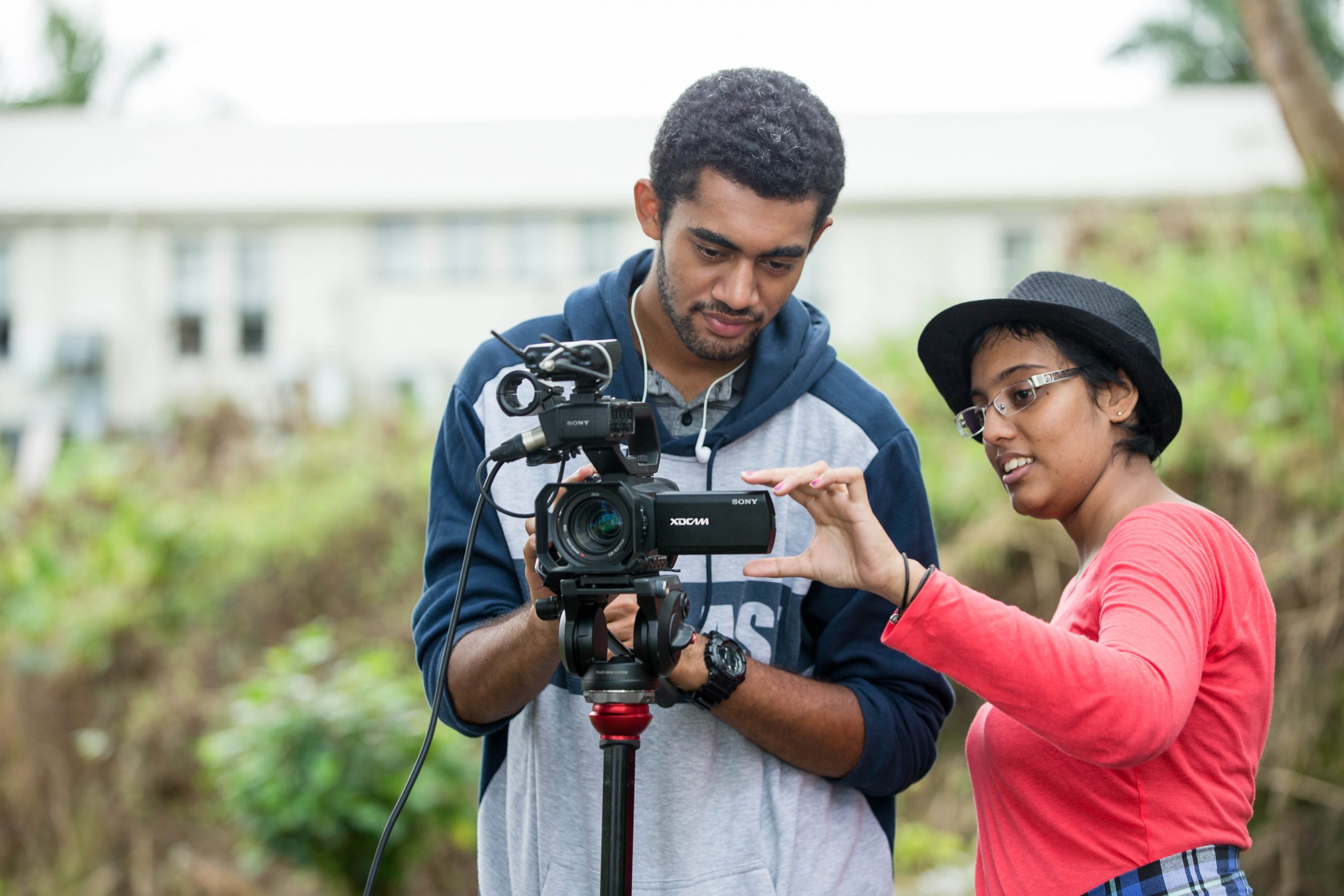 Sarah Robertson (right) tests the camera with a colleague during their practical session.