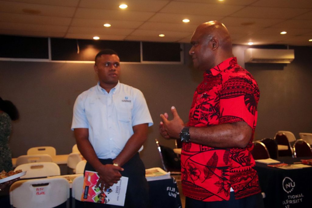 Dr Isimeli with FRCS representative