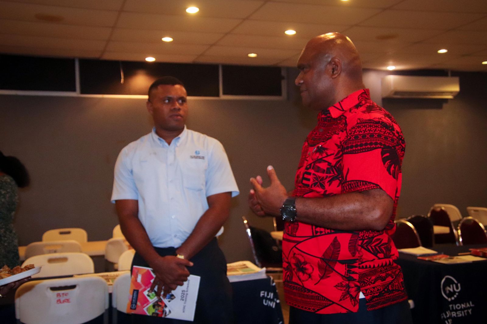 Dr Isimeli with FRCS representative