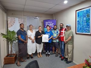 Fiji National University Foundation team poses for a picture with Fiji Red Cross Society's Lokesh Rajarseka and Pacific Sister Founder Cecilia Lin at the Nasinu Campus on Friday, 21 June 2025. 