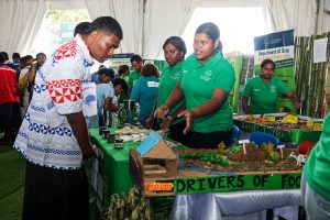 Students visit FNU’s College of Agriculture, Fisheries and Forestry booth during the Open Day. 