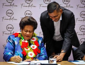 Pattison FNU Vice-Chancellor, Professor Unaisi Nabobo-Baba signs the MOA.