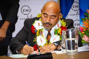 FNU Foundation Executive Director, Kanito Lovobalavu sign's the MOA. 