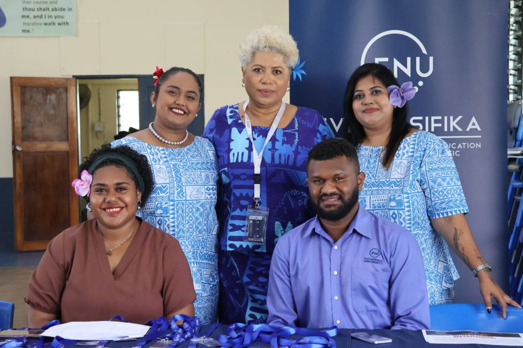 Team FNU with Acting Director Marketing and Communications Ella Bennion (Standing Centre) at the training